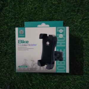 TANGO Bike Mobile Holder retail packaging box displaying a black heavy-duty handlebar smartphone mount over a green grass backdrop