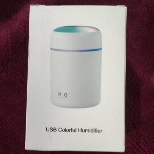 White retail packaging box of H2O USB Colorful Humidifier showing the mini cylindrical air humidifier device with a glowing gradient top
