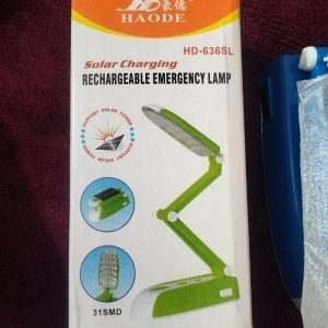HAODE HD-636SL solar charging rechargeable emergency lamp retail packaging box showing a green foldable 31 SMD LED desk light